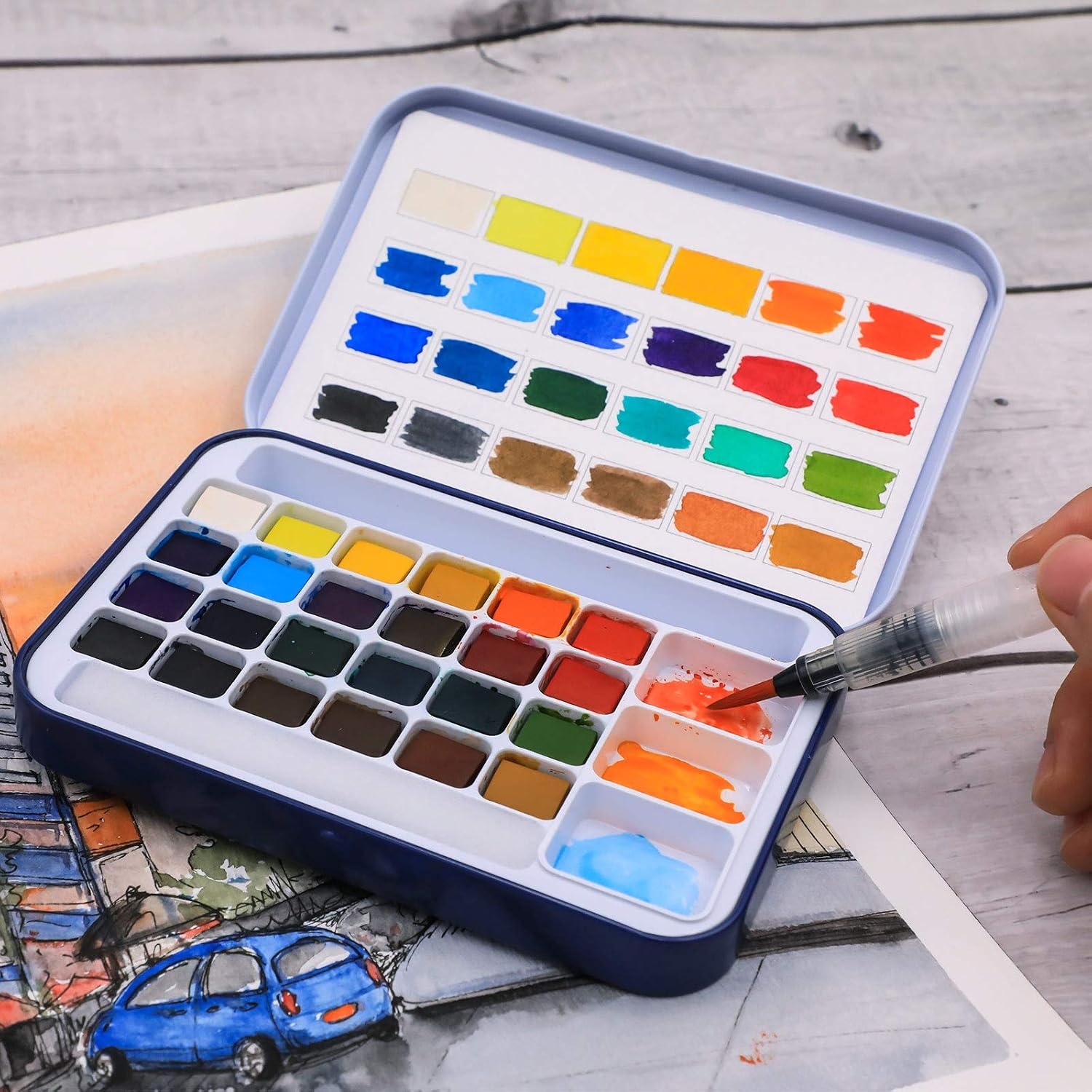 image:imageArtecho 24 Colors Watercolor Paint Set Portable Travel Tin Box with Brush  Watercolor Paper Color Chart amp Sponge Included  Lightweight Metal Case  Creative Gift for Artists Students Beginners24 colors